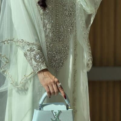 img_3904 Elegant traditional dress with intricate embroidery and beadwork for special occasions.