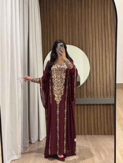 Elegant traditional red embroidered dress with gold details for special occasions - Taj Almaha.
