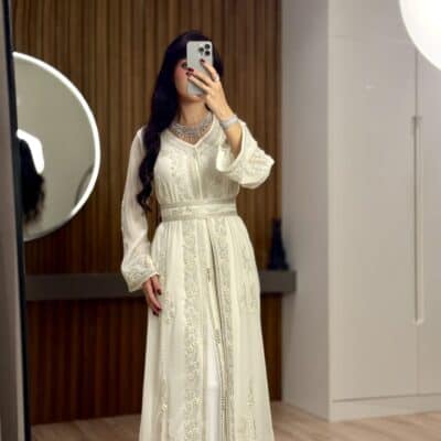 Elegant white embroidered traditional dress, perfect for special occasions and weddings.