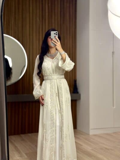 Elegant white embroidered traditional dress, perfect for special occasions and weddings.