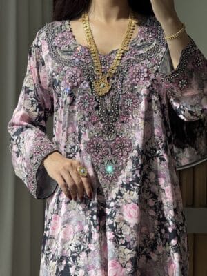 Elegant embroidered floral kaftan with intricate beadwork for women.