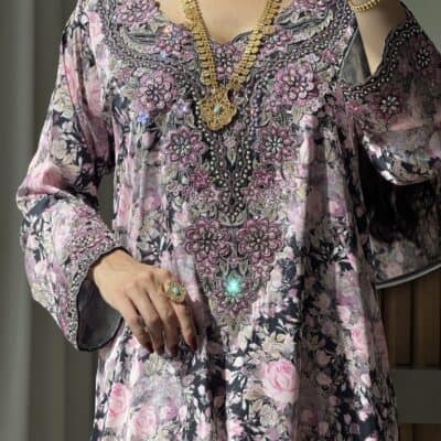 Elegant embroidered floral kaftan with intricate beadwork for women.