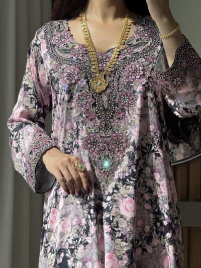 Elegant embroidered floral kaftan with intricate beadwork for women.